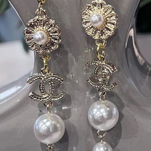 NWOT - Beautiful, elegant gold tone Chanel like, three pearl drop earrings